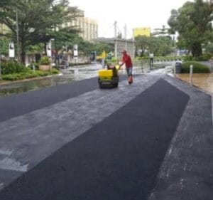 perbedaan jalan aspal hotmix dan aspal biasa