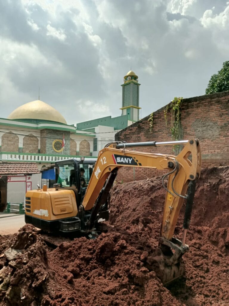 proses cut and fill tanah menggunakan excavator