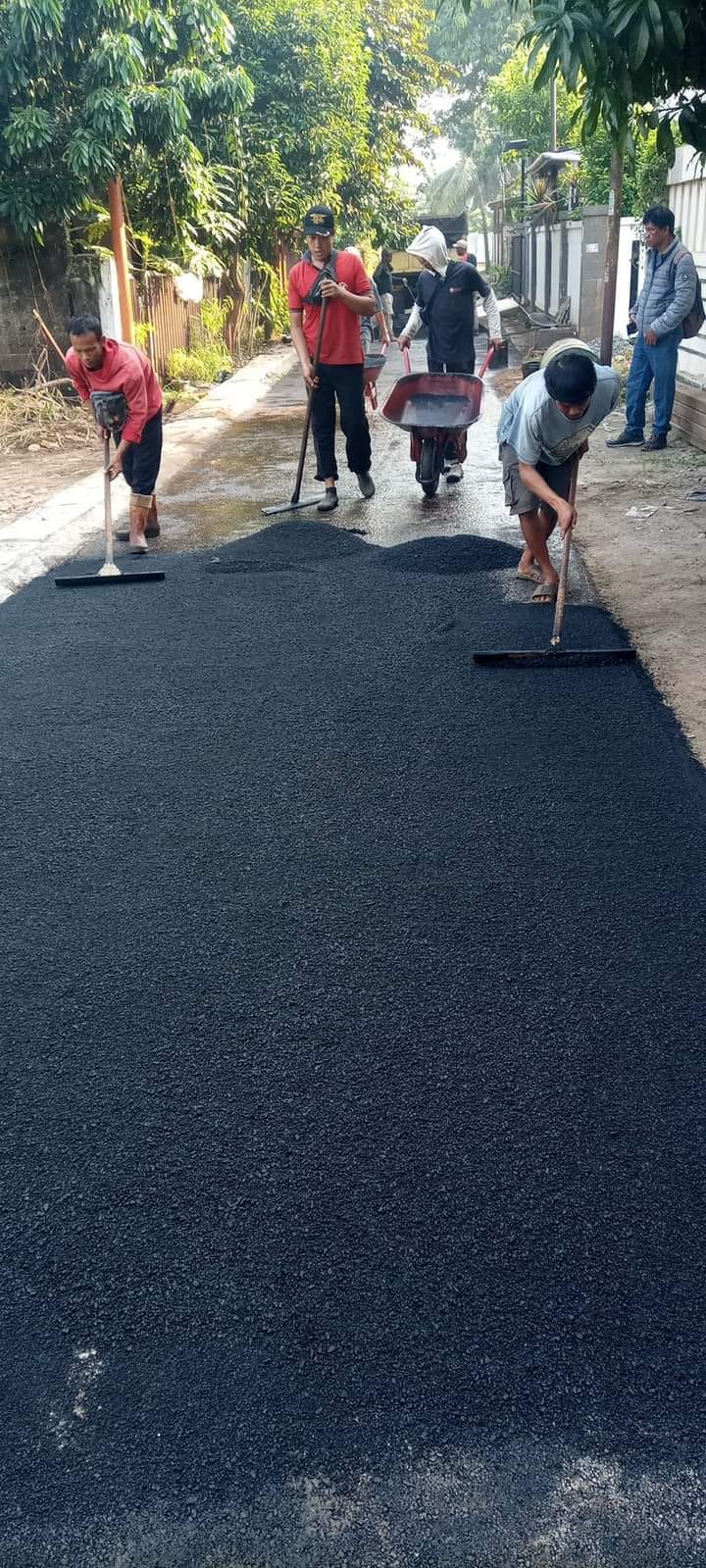 proses pengaspalan jalan hotmix